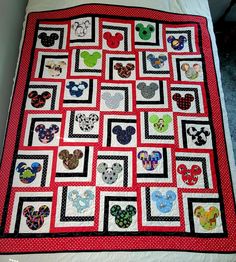 a quilt made to look like mickey mouse heads