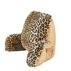 a leopard print pillow on top of a white background