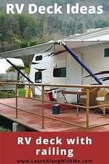 rv deck with rail and chairs on it