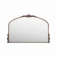 a large mirror with an ornate frame