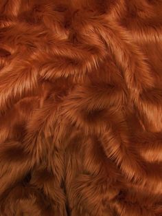 an animal fur texture is shown in this close up photo, it appears to be brown