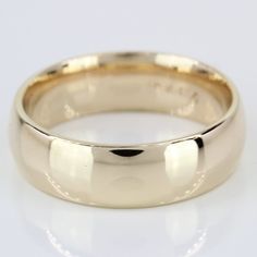 a close up view of a wedding ring on a white background