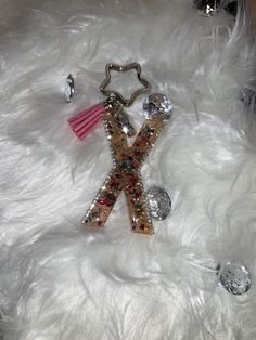 a keychain that has been made to look like the letter k