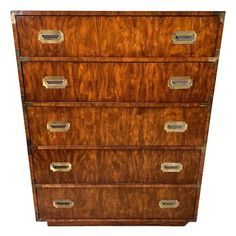 an antique chest of drawers with brass handles