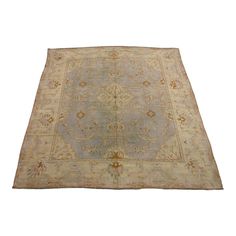 an antique rug is shown on a white background