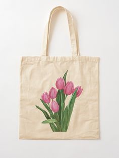 a tote bag with pink tulips painted on it