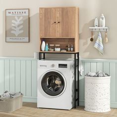 a washer and dryer in a small room