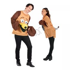 a man and woman dressed up as the muppet from disney's animated movie