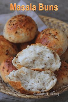 some type of bread that is sitting in a basket with the words masala buns on it