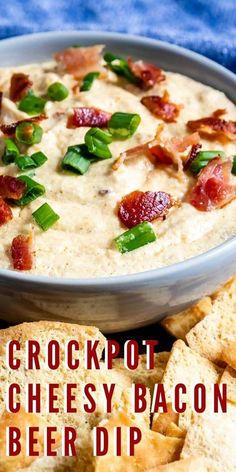 crockpot cheesy bacon beer dip in a bowl surrounded by crackers