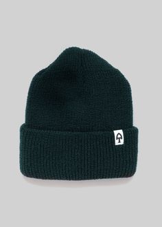 An American Trench staple, the Merino Cardigan Stitch Beanie comes constructed in a classic stitch with the shape necessary to wear either above or below the ears. Merino Wool regulates temperature far better than other fibers which means this beanie will perform in rain, shine, or snow. Classic Cardigan, The Shape, Merino Wool, Wool, Knitting, How To Wear