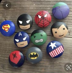 the avengers and spider - man buttons are all painted on each one's face