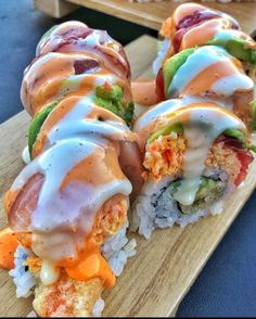 some kind of sushi with sauce on it