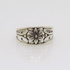 Sterling Silver Flower Ring ....Marked 925...Total of weights 2.5grams...Size 8...Measure of Face 9.2MM...It's in very good condition. Cheap Silver Flower Ring For Women, Cheap Silver Flower Ring, Cheap Silver Flower Ring For Gift, Cheap Vintage Flower Ring, Luxury Vintage Sterling Silver Flower Ring, Sterling Silver Rings Vintage, Silver Vintage Rings, Silver Flower Ring, Vintage Silver Rings