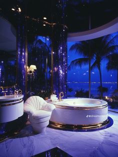 a luxurious bathroom with an oval tub and round sink