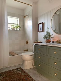 the bathroom is clean and ready to be used by someone in their home or business