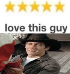 a man wearing a cowboy hat and holding a red flag with five stars on it