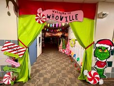 an entrance decorated with dr seuss and candy canes