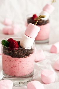 two desserts with marshmallows, raspberries and chocolate