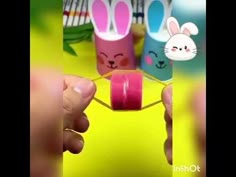 someone is holding up some bunny and rabbit pencils