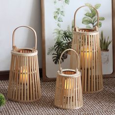 three bamboo lanterns sitting on top of a rug