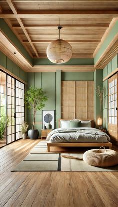 a bedroom with green walls and wooden floors