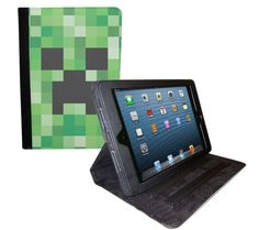 an ipad case with a blue camo pattern on the front and black leather cover