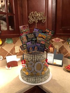 a cake made out of money sitting on top of a counter