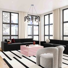 a living room filled with black and white furniture