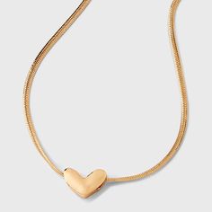 The Herringbone Heart Charm Quartz Chain Necklace from Universal Thread™ makes a statement piece in your jewelry collection. The chain necklace features a stylish herringbone pattern and comes adorned with a heart charm dangling down at the center and quartz stone on the extender chain for a gorgeous look. The gold-tone necklace closes with a lobster-claw clasp at the back, where an extra length of chain makes the length fully adjustable. Universal Thread™: The denim collection that's true to yo Everyday Heart Shaped Box Chain Necklace, Everyday Heart-shaped Box Chain Necklace, Snake Chain Heart Necklace For Gifts, Elegant Necklace With Heart Charm On Snake Chain, Valentine's Day Necklace With Box Chain And Heart Pendant, Cute Butterfly, Dainty Gold Necklace, Everyday Necklace, Gold Tone Necklace