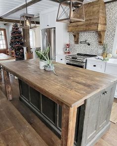 an island in the middle of a kitchen