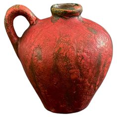 an old red vase is shown on a white background for use as a design element