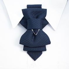 "Hopper tie is original product, presented by Ruty Design. This unisex accessory is a modern combination of elements found on traditional ties and bow ties. It is recommended not to tighten the regulation strip too much: Hopper tie is at its best when leveled up with the collar line. Freestyle fashion lovers should bear in mind that this accessory also looks great with the collar unbuttoned.  The bow tie is attached to an adjustable strap. Fitting approx 50-53 cm /19.7-20.9 in. neck size Name: H Luxury Tie For Gift, Luxury Standard Tie For Gift, Luxury Gift Tie, Modern Suit And Tie Accessories For Party, Elegant Party Ties For Father's Day, Blue Elegant Tie For Father's Day, Modern Blue Ties For Formal Occasions, Elegant Blue Tie For Father's Day, Dapper Blue Tie For Gift