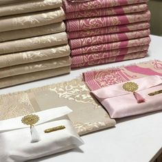 a table topped with lots of different types of cloths