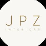 the logo for j pz interiors is shown in gold on a white circle with black background