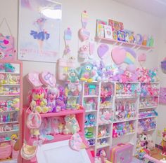 a room filled with lots of toys and stuffed animals on shelves next to each other