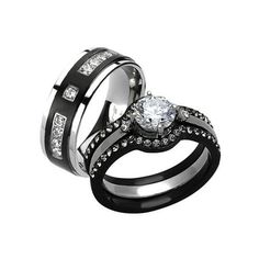 two black and white wedding rings with diamonds on each one, set in stainless steel