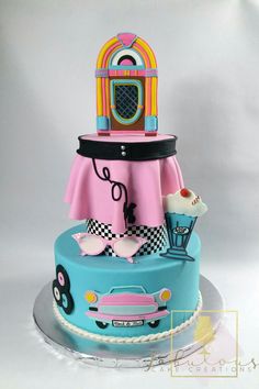 a cake that is decorated to look like an old fashion car and ice cream parlor