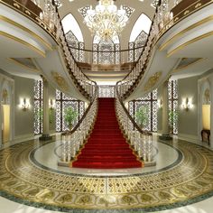 an elaborately decorated staircase with red carpet and chandelier on the ceiling is surrounded by white walls