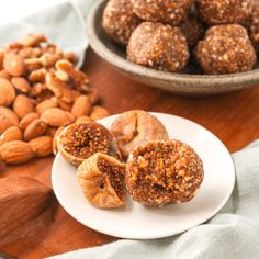 nuts and almonds are sitting on a plate