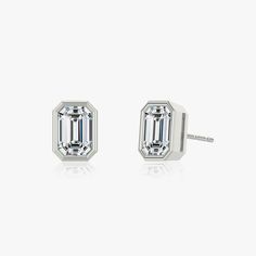 The Bezel Solitaire Studs combine vintage-inspired detail and modern appeal together for a look that’s timelessly elegant. Classic White Gold Earrings With Timeless Design, Classic White Gold Earrings, Timeless Platinum Earrings, Classic White Gold Baguette-cut Earrings, Classic Sterling Silver Earrings With Timeless Design, Luxury Timeless Silver Earrings, Elegant Timeless Diamond Earrings For Anniversary, Classic Sterling Silver Jewelry With Timeless Design, Classic Diamond Earrings With Polished Finish For Formal Events