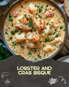 lobster and crab bisque in a bowl with bread, parsley on the side