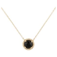 This Black Onyx & Diamond Pendant is a stunning and timeless accessory that can add a touch of glamour and sophistication to any outfit. This pendant features a 1.00 Carat Round Black Onyx, with a Diamond Halo comprised of 0.06 Carats of Single Cut Round White Diamonds. This pendant is set in 14K Yellow Gold, and the diameter measures out at 9MM. Yellow Gold Pendants, Timeless Accessories, Gold Pendant Necklace, Halo Diamond, Diamond Pendant, Black Onyx, Diamond White, Gold Pendant, Onyx