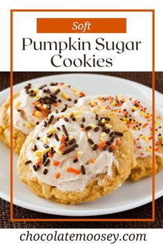 soft pumpkin sugar cookies with sprinkles on a white plate