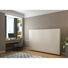 a white radiator in a bedroom next to a desk