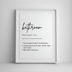 a bathroom rules poster hanging on the wall next to a white shelf with a black and white photo