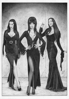 three women in black dresses standing next to each other with their hands on their hips