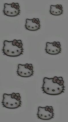 some hello kitty wallpapers on a gray background with black and white cats in the middle