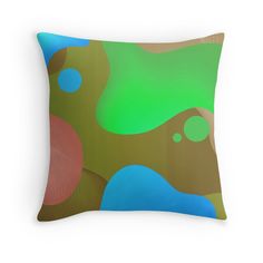 an abstract pillow with blue, green and pink circles on it's back side