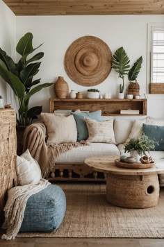 a living room filled with lots of furniture and plants on top of a wooden shelf